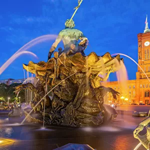 View of Rotes Rathaus (Town Hall) and Neptunbrunnen fountain at dusk, Panoramastrasse, Berlin, Germany, Europe