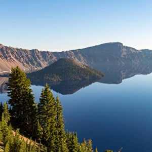 Wizard Island and the still waters of Crater Lake, the deepest lake in the U. S. A