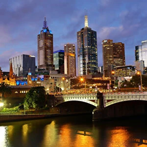 City skyline of Melbourne at sunset and Princes Bridge over the Yarra River, Melbourne