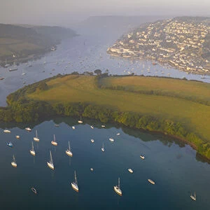 Aerial view of Salcombe and the Kingsbridge Estuary at dawn on a misty morning