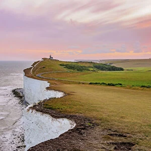 Beachy Head Cliffs and Belle Tout Lighthouse at sunset, Eastbourne, East Sussex, England, United Kingdom