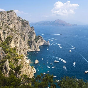 Capri island coast, with Amalfi Coast on the background. Capri, Campania, Italy