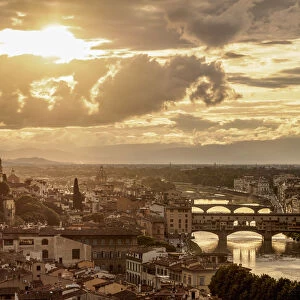 Cityscape with Ponte Vecchio and Arno River at sunset, Florence, Tuscany, Italy