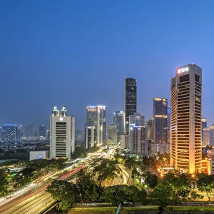 Financial district skyline at night, Jakarta, Java, Indonesia