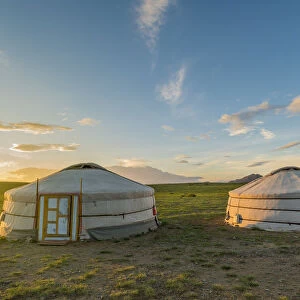 Mongolian nomadic traditional gers at sunset. Middle Gobi province, Mongolia
