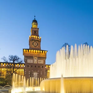 Sforzesco castle and fountain at sunset. Milan, Lombardy, Italy
