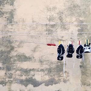 Shoes on washing line, Chioggia, Venice, Veneto, Italy
