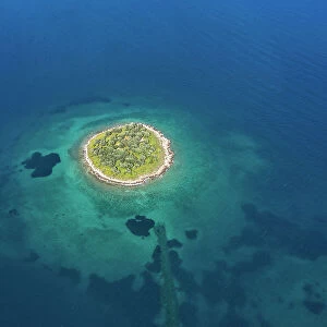 The st. Athanasios island in a blue sea, Greece