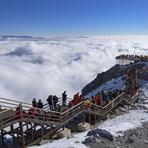 Tourists on Jade Dragon Snow Mountain (Yulong Xueshan), Lijiang, Yunnan, China