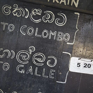 Train timetable at Weligama station, Weligama, Southern Province, Sri Lanka