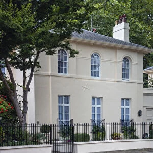 UK, England, London, Borough of Camden, early 19th Century Regency era neo-classical townhouses with stucco facades near Regents Park. Expensive real estate. No people