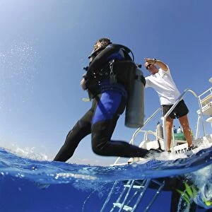 Cayman Islands Technical Diver entering water with assistance, Divetech, Grand Cayman Island, Cayman Islands, Caribbean