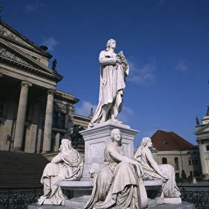 GERMANY, Berlin The Friedrich Schiller Memorial statue by Reinhold Begas in front of