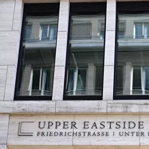 Germany, Berlin, Mitte, New York influenced sign reading Upper Eastside Berlin