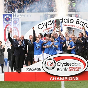 Rangers Football Club: Triumphant Moment - Celebrating SPL Championship Win with Captain David Weir at Ibrox Stadium