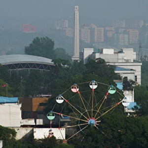 A ferris wheel is seen in the North Korean town of Sinuiju from the Chinese side of the