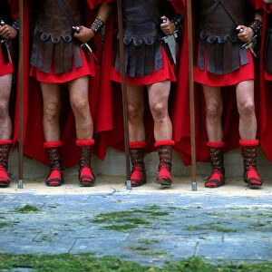Locals dressed as Roman soldiers take part in a Via Crucis representation on Good Friday