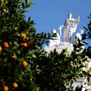 Riverside County Court House is seen behind an orange tree in Riverside