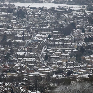 Snow covers the buildings below the Heights of Abraham country park, in Matlock Bath