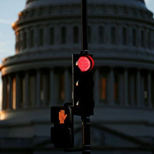 A traffic light shines red after President Donald Trump and the U. S