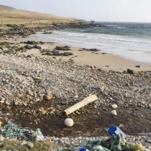 Rubbish washed up on beach from sea, Shetland Islands, Scotland, april