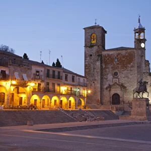 View of city square and church at dusk, Plaza Mayor, Trujillo, Caceres Province, Extremadura, Spain, April