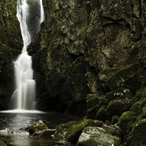 Waterfall cascading through narrow ravine, Catrigg Force, Stainforth Beck, Stainforth, Yorkshire Dales N. P