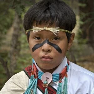 10 year old Hopi boy, Clay Kewanwytewa, dressed in traditional yucca headband, turquoise