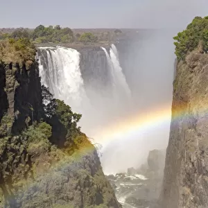 Africa, Zimbabwe, Victoria Falls. Rainbow at Victoria Falls