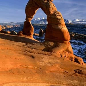 ARCHES NATIONAL PARK, UTAH. USA. Delicate Arch. La Sal Mountains in distance