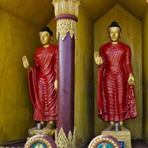 Buddhist statues in Golden Temple, the largest Theravada Buddhist temple in Bangladesh