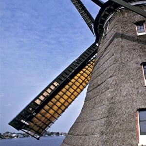 Europe, Netherlands, Amsterdam. A close-up of a windmill shows its thatched sides