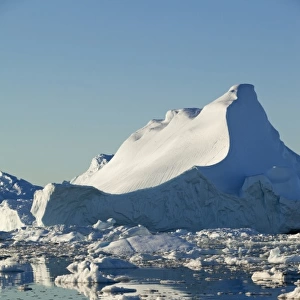 Greenland, Ilulissat, Massive icebergs from Jakobshavn Glacier reflected in Disko