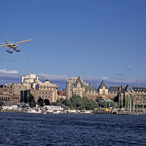 NA, Canada, BC, Victoria Harbor, Kenmore Air float plane makes final approach