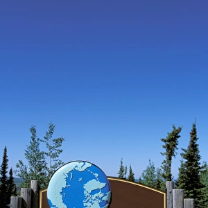 North America, USA, Alaska, Arctic Circle. A sign marks the arctic circle on the