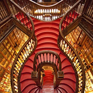 Portugal, Porto. Ornate staircase in the Lello Bookstore