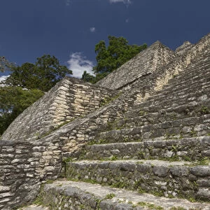 Steep steps at the base of Caana pyramid, Caracol ancient Mayan site, Belize