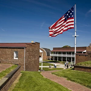 USA, MD, Baltimore. The large 15-star flag flies proudly over Fort McHenry