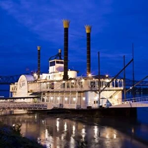 USA, Mississippi, Natchez. Isle of Capri Casino riverboat on Mississippi River, dusk