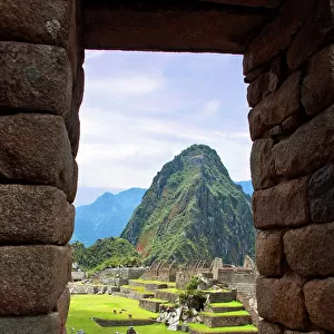 View through window of the ancient lost city of the Inca, Machu Picchu, Peru, South