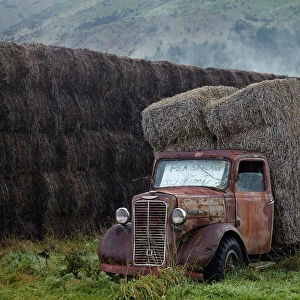 Vintage Commer truck with hay bales, Hawea Flat, near Wanaka, Otago, South Island