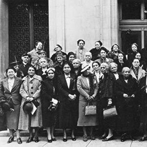 (1875-1955). American educator. Mary McLeod Bethune, center holding flowers, with members of the White House Conference Group of the National Womens Council, April 1938