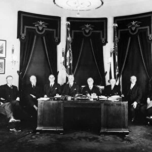 (1882-1945). 32nd President of the United States. Roosevelt in the Oval Office with his first cabinet. Photographed 1933