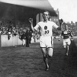 (1889-1966). Finnish long-distance runner. Winning the Amateur Athletic Associations four-mile championship at Stamford Bridge, London: photograph, n. d