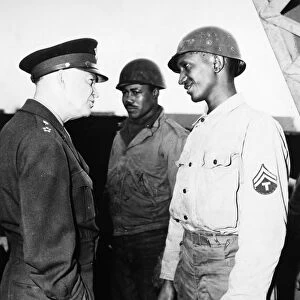 (1890-1969). 34th President of the United States. Eisenhower talking to T / 5 William Carpenter of Nashville while on a tour of Cherbourg, France, in June 1944
