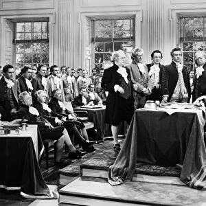 A 20th century film depiction of the signing of the Declaration of Independence at Independence Hall in Philadelphia, Pennsylvania, 4 July 1776