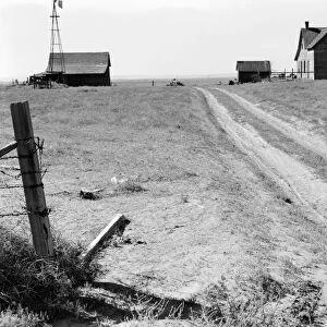 ABANDONED FARM, 1939. An farm and farmhouse in Columbia Basin, Grant County, Washington State
