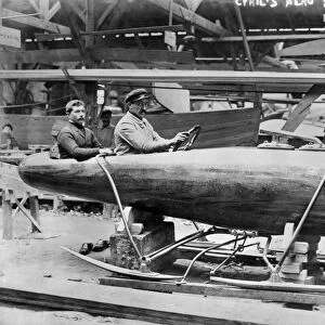 AEROSAN. Two men in an aerosan, a propeller-powered sled