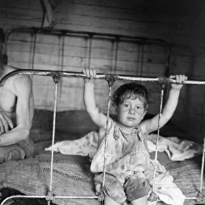 ALABAMA: CHILDREN, 1936. William Fields in his familys home in Hale County, Alabama