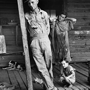 ALABAMA: FAMILY, 1936. Floyd Burroughs, a cotton sharecropper, and the Tingle children